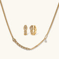 Geometrisches Luxus-Schmuckset mit goldener Halskette und passenden Ohrringen