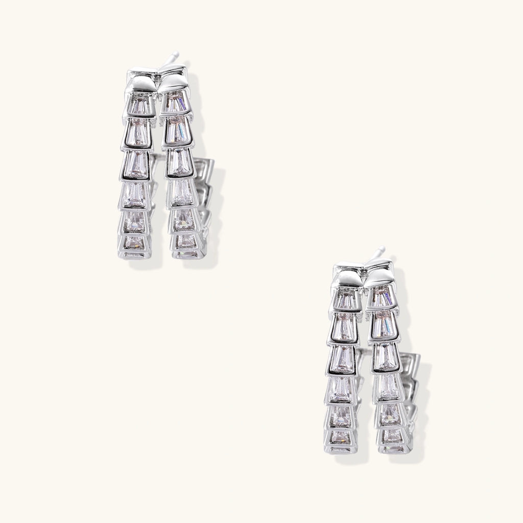 White gold-plated hoop earrings with double row of baguette-cut zirconia stones in geometric ladder design