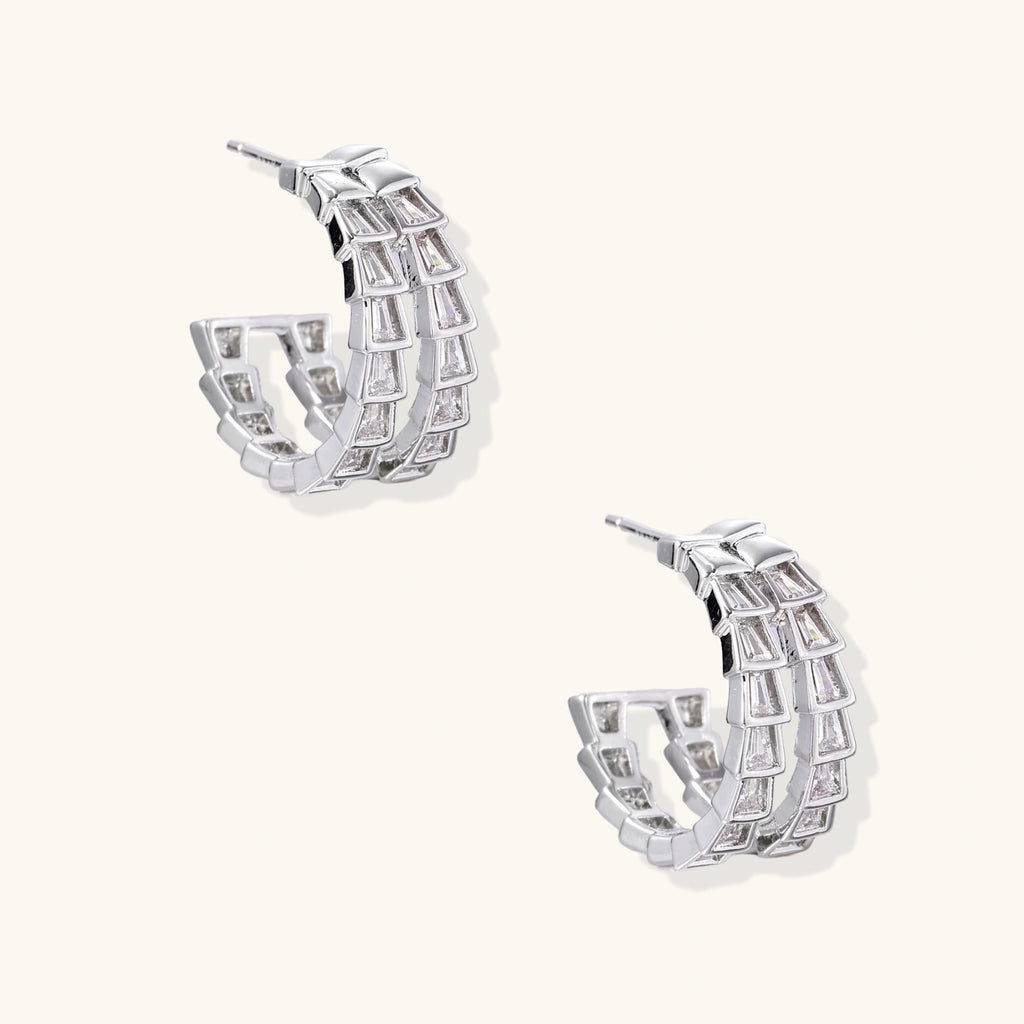 White gold-plated hoop earrings with double row of baguette-cut zirconia stones in geometric ladder design